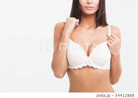 Girl in lingerie on white background 34412886