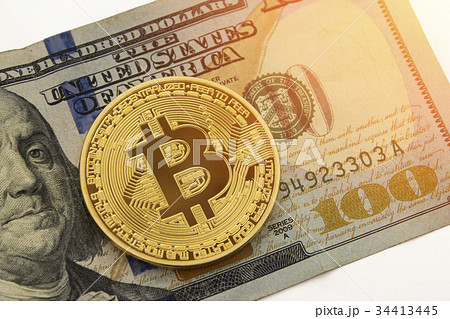 Bitcoin on US dollar with bright sun Bitcoin on US dollar with bright sun 34413445