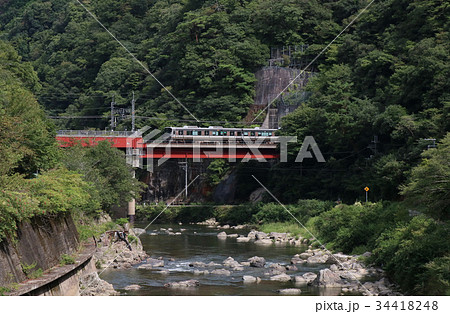 武庫川を渡る武田尾の快速電車 34418248