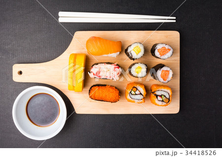 Top view of Sushi set on wooden tray Top view of Sushi set on wooden tray 34418526