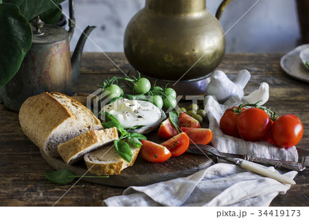 Burrata cheese with tomatoes, Basil and bread 34419173