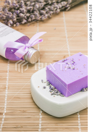 Bar of natural lavandah soap on white soap dish Bar of natural lavandah soap on white soap dish 34422108