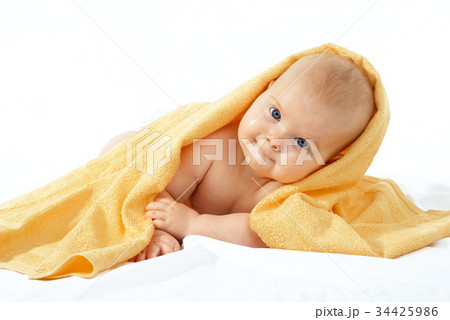 baby in yellow towel 34425986