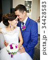 Charming couple bride and groom in the lobby 34428583