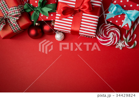 Creative composition of sweets and presents Creative composition of sweets and presents 34429824