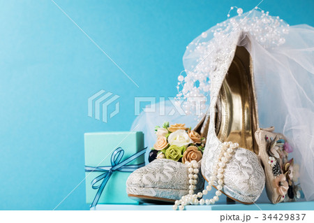 Beautiful arrangement of shoes bridal accessories 34429837
