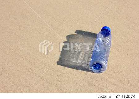 Plastic bottle trash on the beach. 34432974