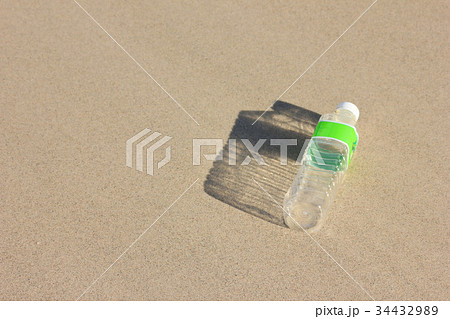 Plastic bottle trash on the beach. 34432989