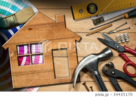 Home Improvement Concept - Work Tools and House Home Improvement Concept - Work Tools and House 34435170