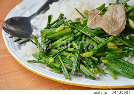 stir fried garlic chives with pork liver on rice stir fried garlic chives with pork liver on rice 34439987