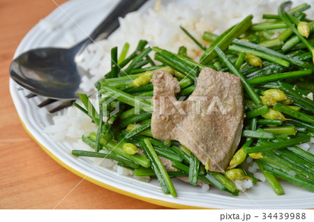 stir fried garlic chives with pork liver on rice stir fried garlic chives with pork liver on rice 34439988