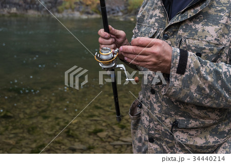Fisherman at the Altai river Fisherman at the Altai river 34440214