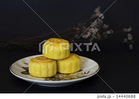 Mid Autumn Festival moon cakes on black background 34440688