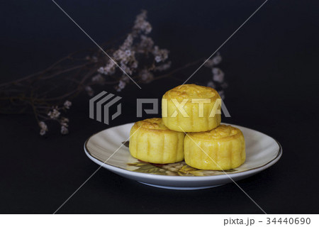 Mid Autumn Festival moon cakes on black background 34440690