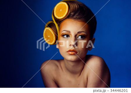 woman with fruit in hair 34446201