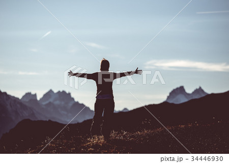 Hiker in high altitude rocky mountain landscape. Hiker in high altitude rocky mountain landscape. 34446930