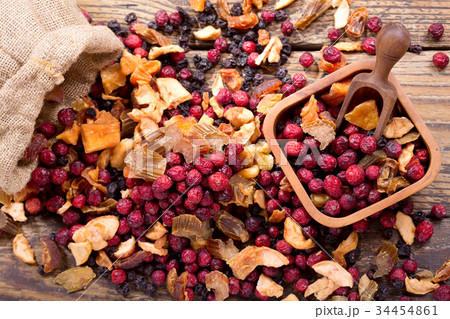 mixed of dried fruits  on a wooden table 34454861