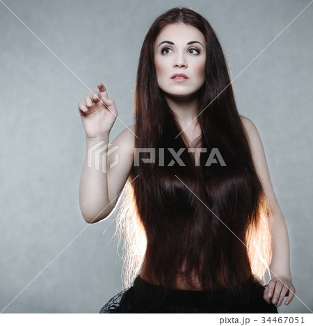 Beautiful woman with very long hair Beautiful woman with very long hair 34467051