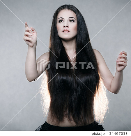 Beautiful woman with very long hair Beautiful woman with very long hair 34467053