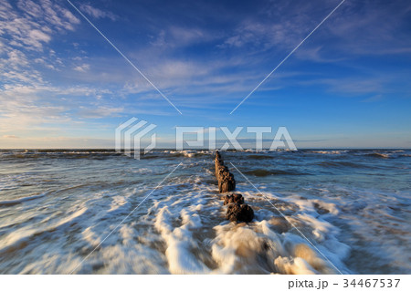 Baltic Sea and the breakwater at dusk 34467537