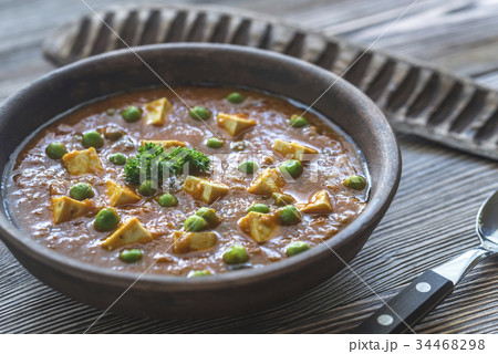 Bowl of mattar paneer 34468298