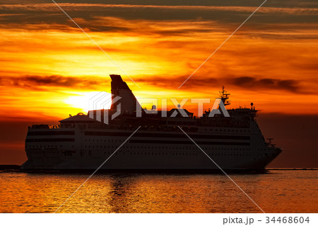 White cruise liner at sunset 34468604