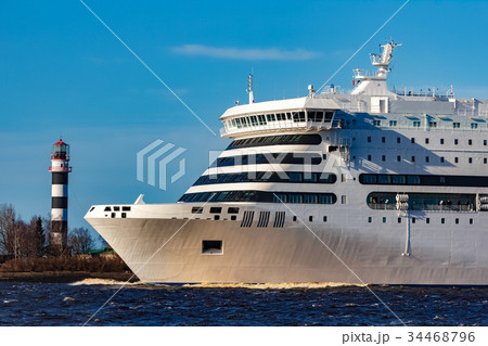 White passenger ship underway White passenger ship underway 34468796