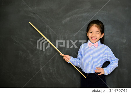 happy cheerful little girl dressed as teacher happy cheerful little girl dressed as teacher 34470745
