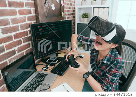 cheerful woman computer engineer finished work 34471618