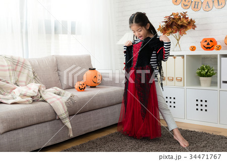 kids look at new Halloween witch dress kids look at new Halloween witch dress 34471767