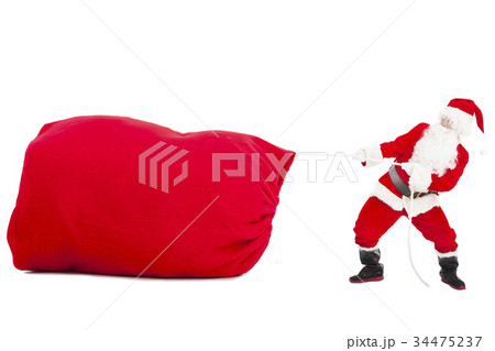santa claus pulling a big gift bag santa claus pulling a big gift bag 34475237