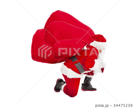 santa claus carrying heavy gift bags santa claus carrying heavy gift bags 34475239