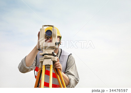 Surveyor engineer making measure  34476597