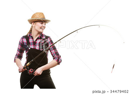 Happy woman in sun hat holding fishing rod Happy woman in sun hat holding fishing rod 34479402