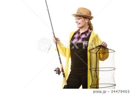 Happy woman holding fishing rod and keepnet 34479403