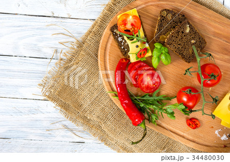Sandwich with vegetables and hot pepper. Copyspace Sandwich with vegetables and hot pepper. Copyspace 34480030