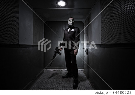 Male with the rifle and gas mask Male with the rifle and gas mask 34480522