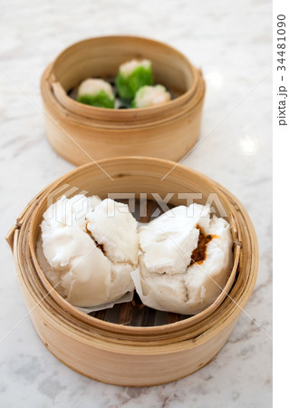 Chinese steamed bun filled with bbq pork Chinese steamed bun filled with bbq pork 34481090