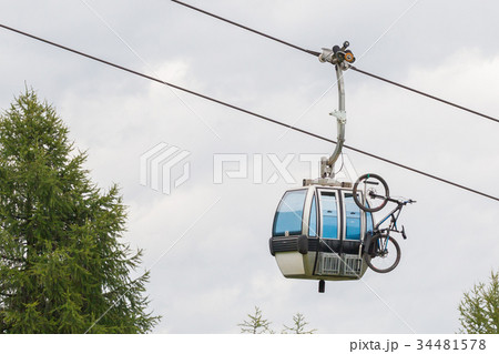 Ski lift cable booth or car with a mountainbike  34481578