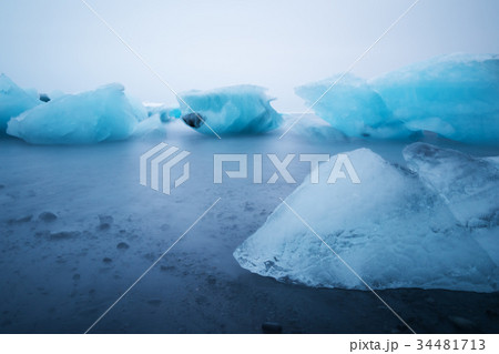 Melting ice on Ice Beach at Jokulsarlon glacier Melting ice on Ice Beach at Jokulsarlon glacier 34481713