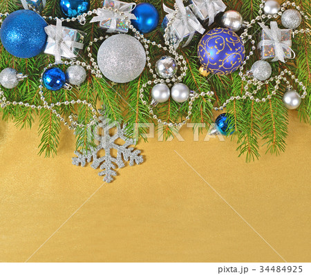 Christmas decorations on a spruce branch 34484925