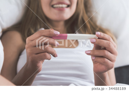 Happy young woman will be mother Happy young woman will be mother 34488189