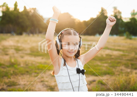 pretty girl listening music and dancing pretty girl listening music and dancing 34490441