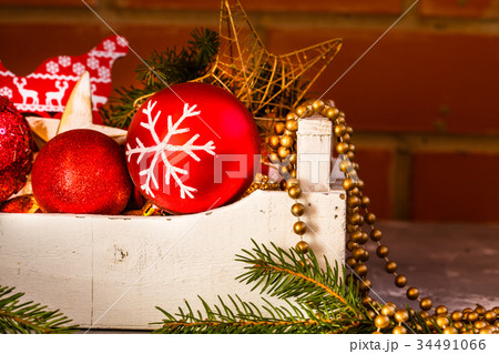 Christmas toys in a wooden box. Christmas toys in a wooden box. 34491066