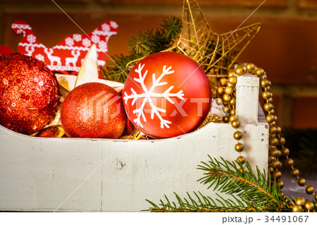 Christmas toys in a wooden box. Christmas toys in a wooden box. 34491067