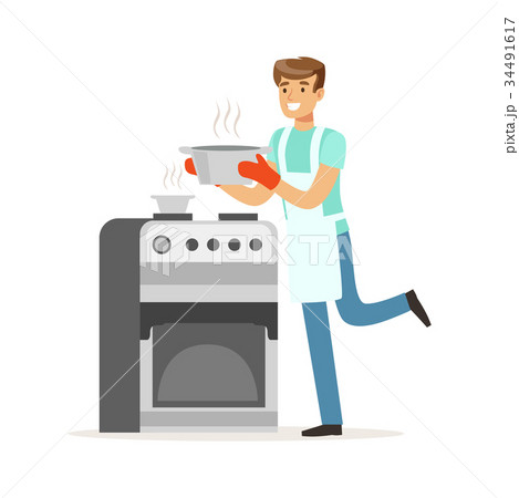 Young smiling man cooking in the kitchen, house 34491617