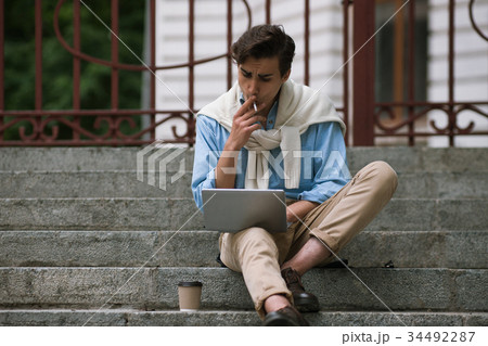 Modern communication. Male with bad habits 34492287
