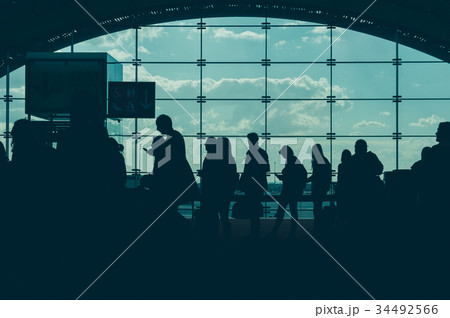 Traveling concept. Airport terminal blurred crowd 34492566