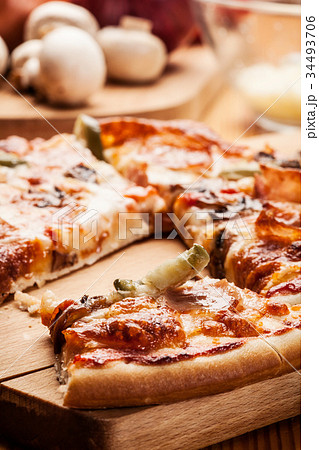 Pizza with cheese and ham Pizza with cheese and ham 34493706