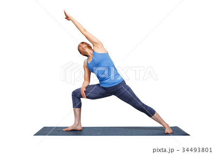 Woman doing Ashtanga Vinyasa yoga asana Utthita Woman doing Ashtanga Vinyasa yoga asana Utthita 34493801